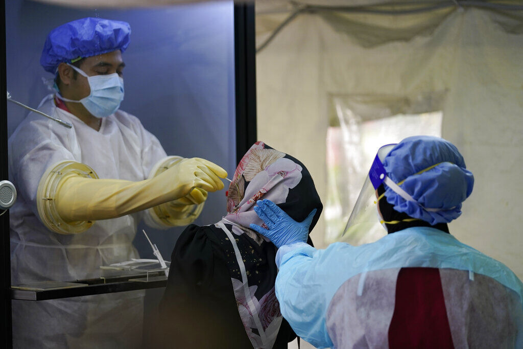 APTOPIX Virus Outbreak Malaysia